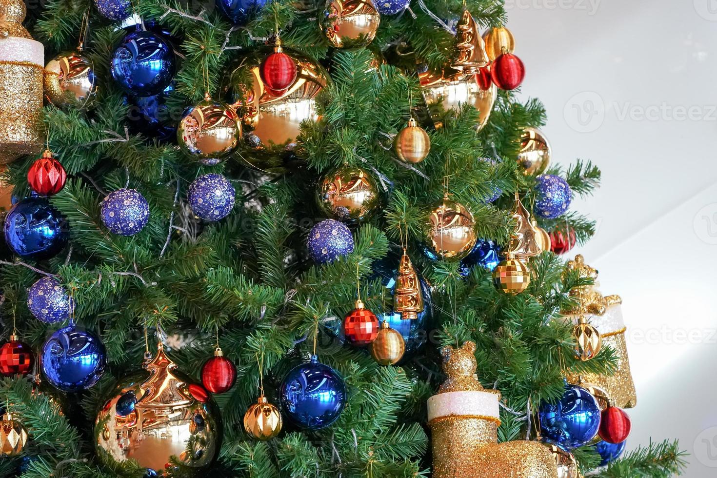 Christmas tree white and green colour and new year decoration in the department store. photo
