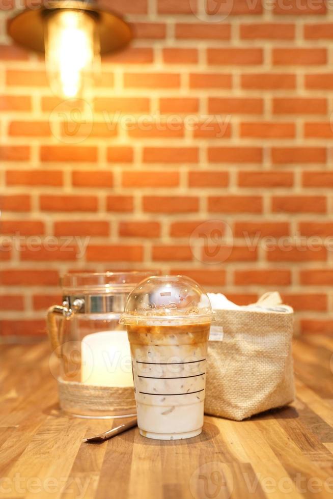 ice latte close up show mixed milk with coffee. photo