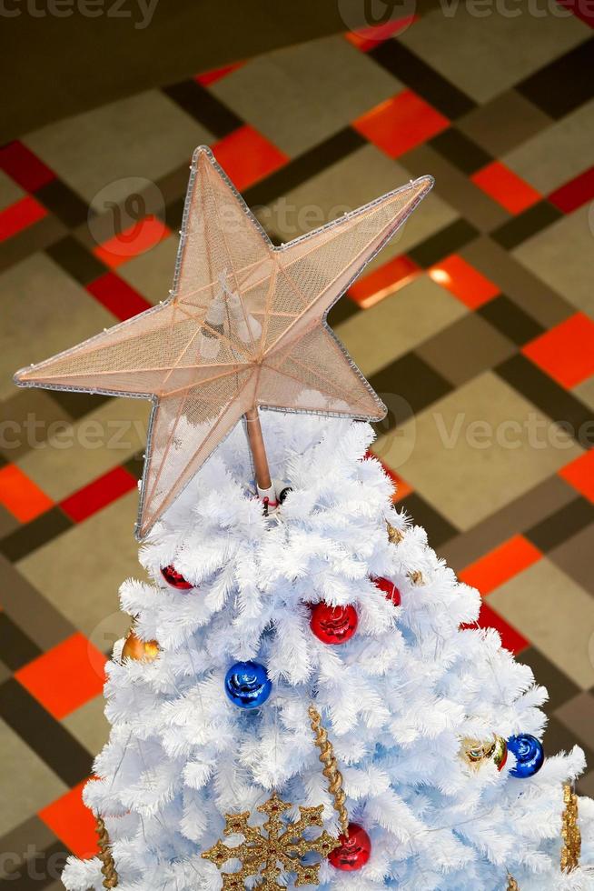 Christmas tree white and green colour and new year decoration in the department store. photo