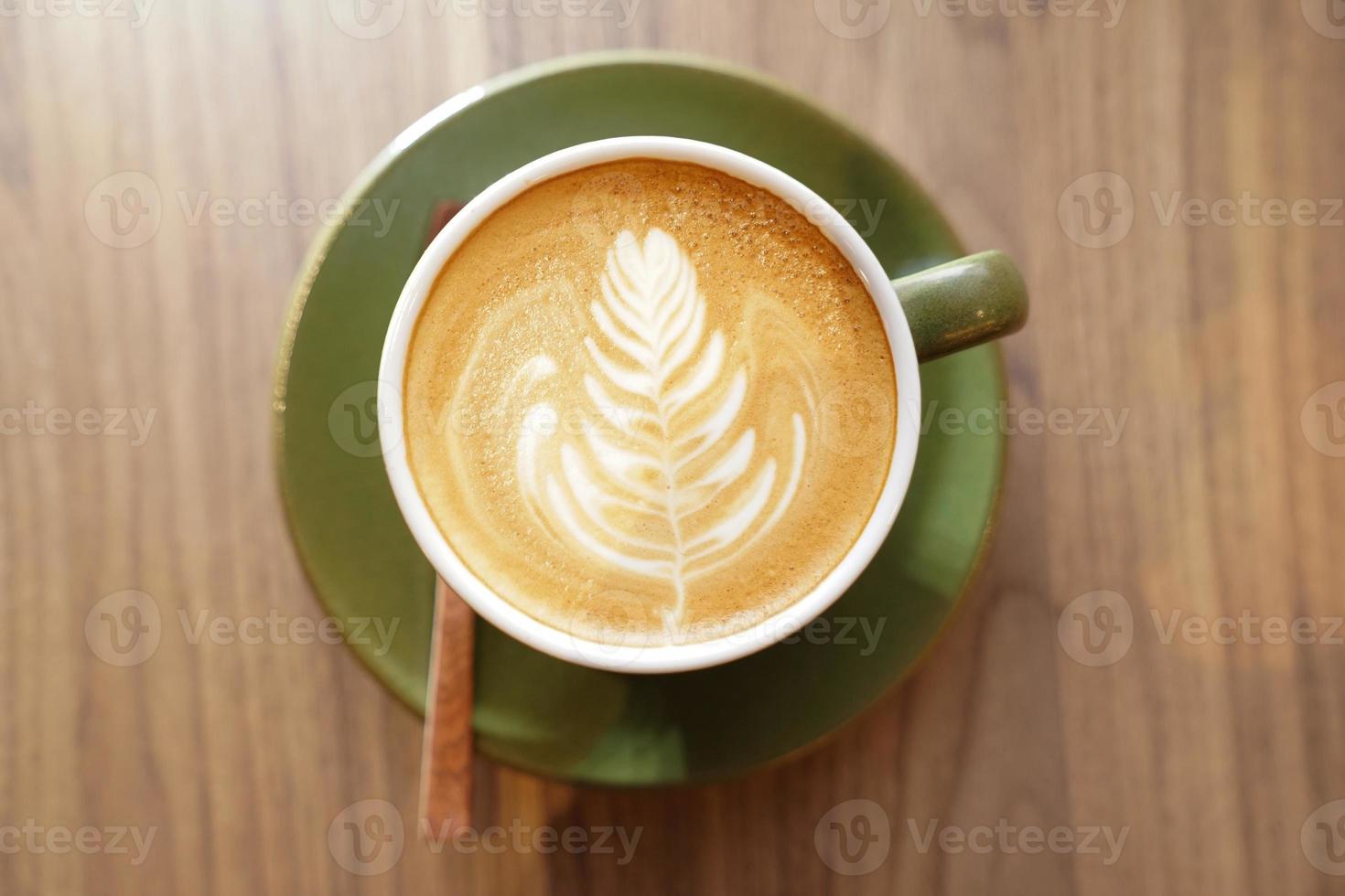 Latte hot coffee in the cup, to refresh in the morning. photo