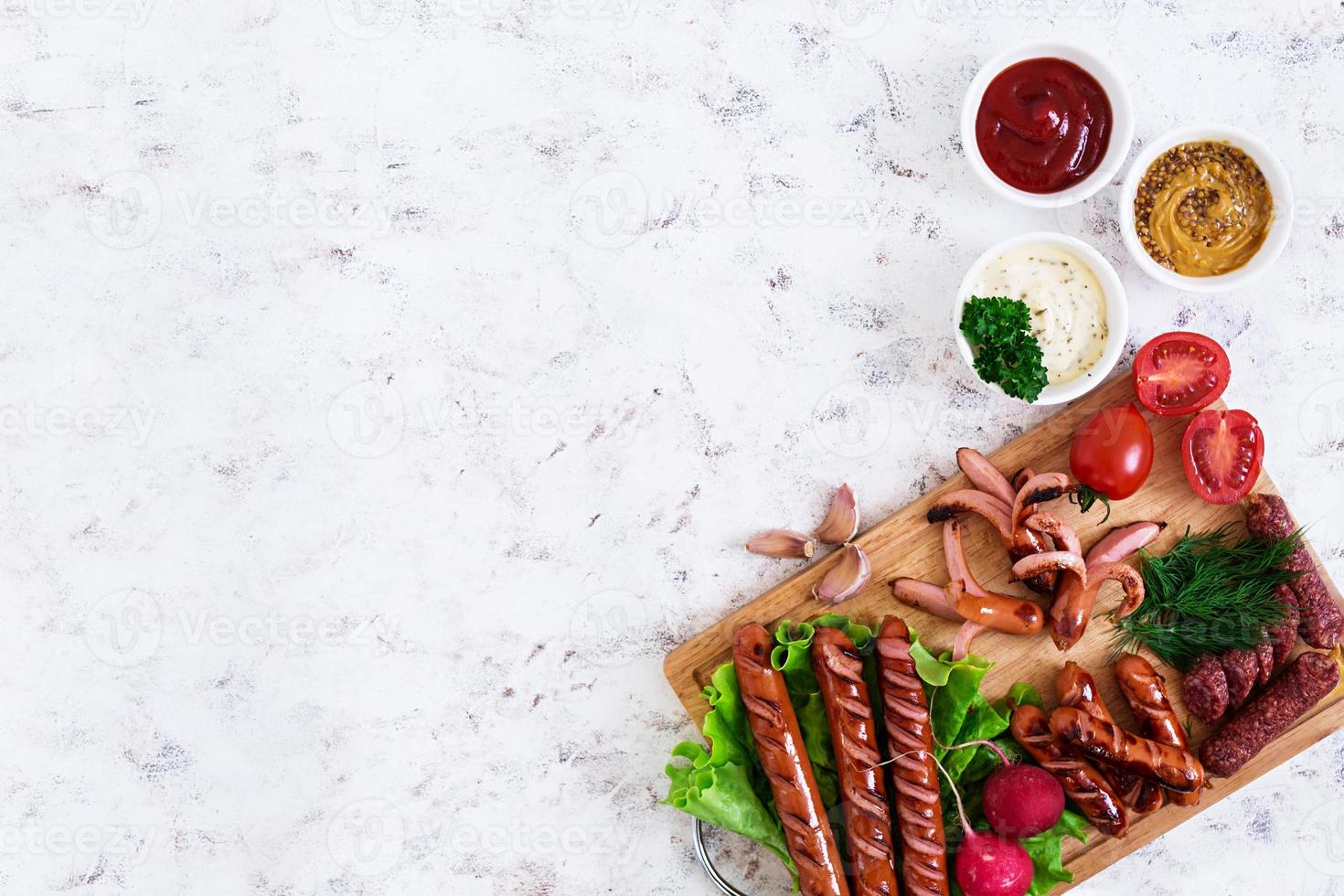 Beer with sausages and spices. Top view photo