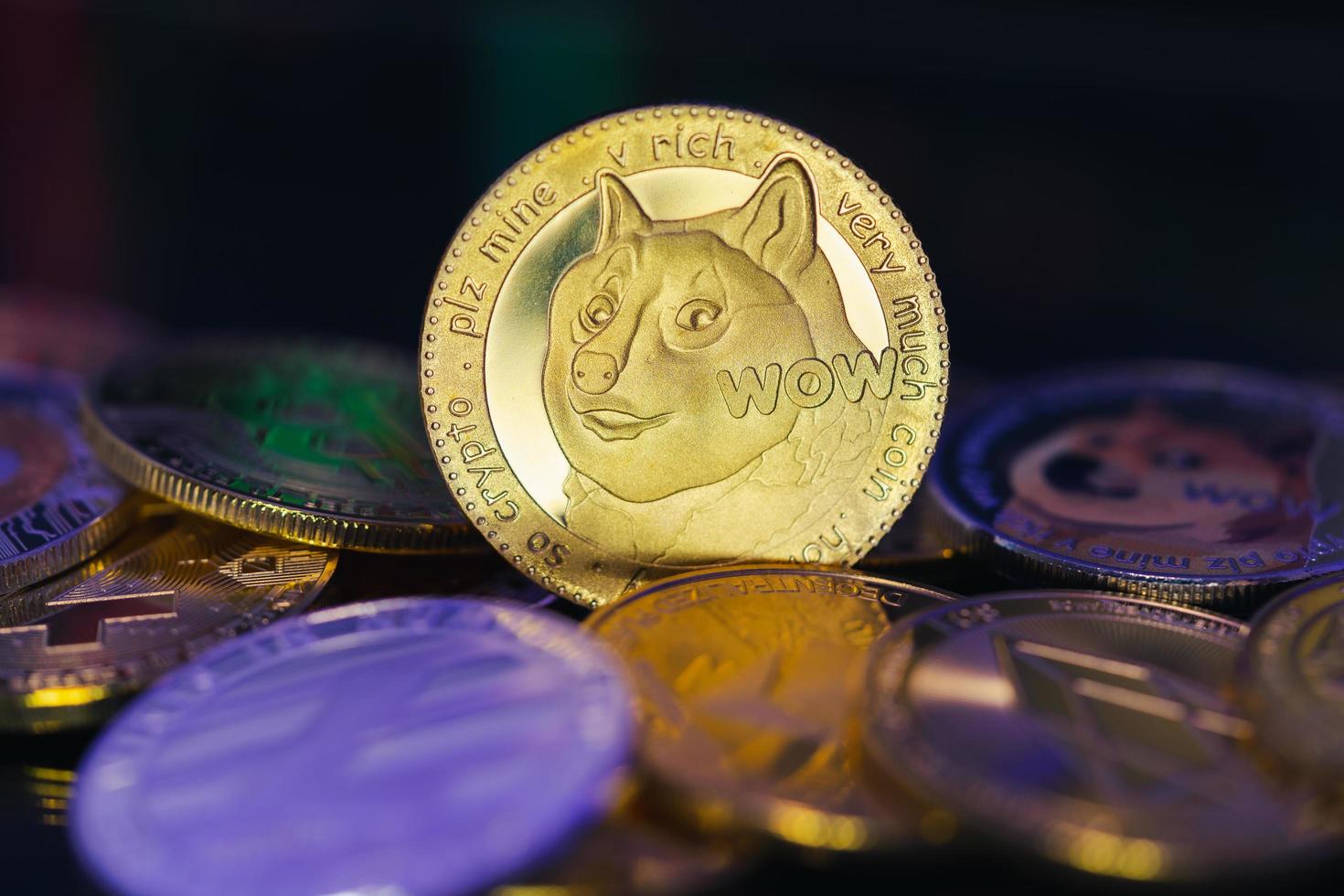 Dogecoin DOGE group included with all crypto currency coin bitcoin, Ethereum ETH, Binance Coin symbol Virtual blockchain technology future is money defocused background Close up and Macro photography photo