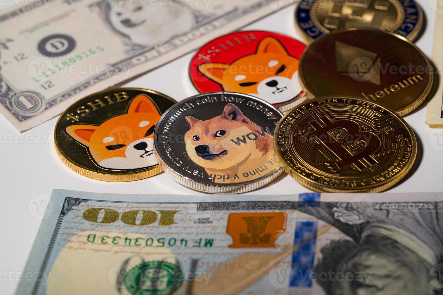 Dogecoin DOGE, bitcoin, Ethereum ETH, shib Coin, included with Crypto currency coin  on stack 100 hundred new US dollar Money American Virtual blockchain technology future is money Close up concept photo