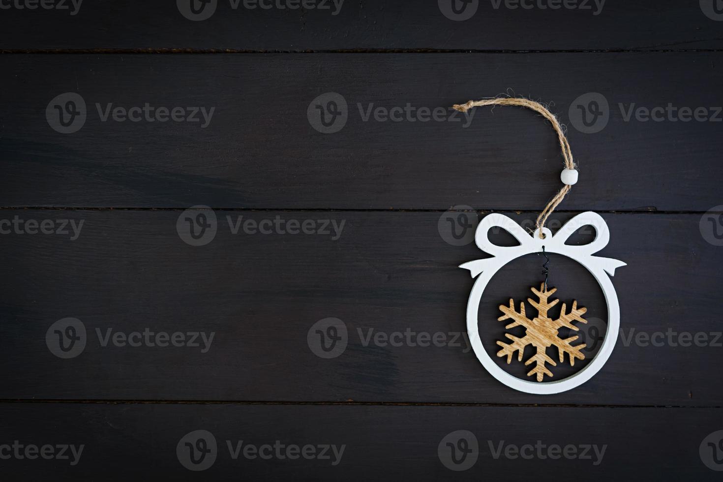 Christmas toy on dark wooden background photo