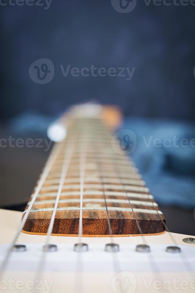 Electric guitar on dark background photo