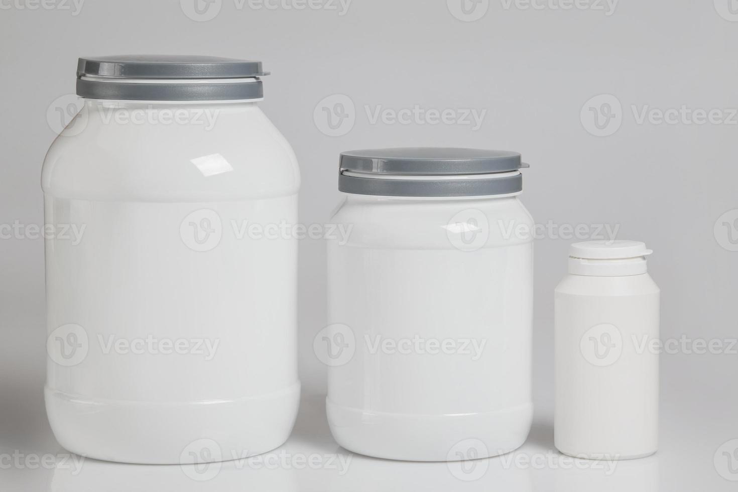 Jars with food supplements photo