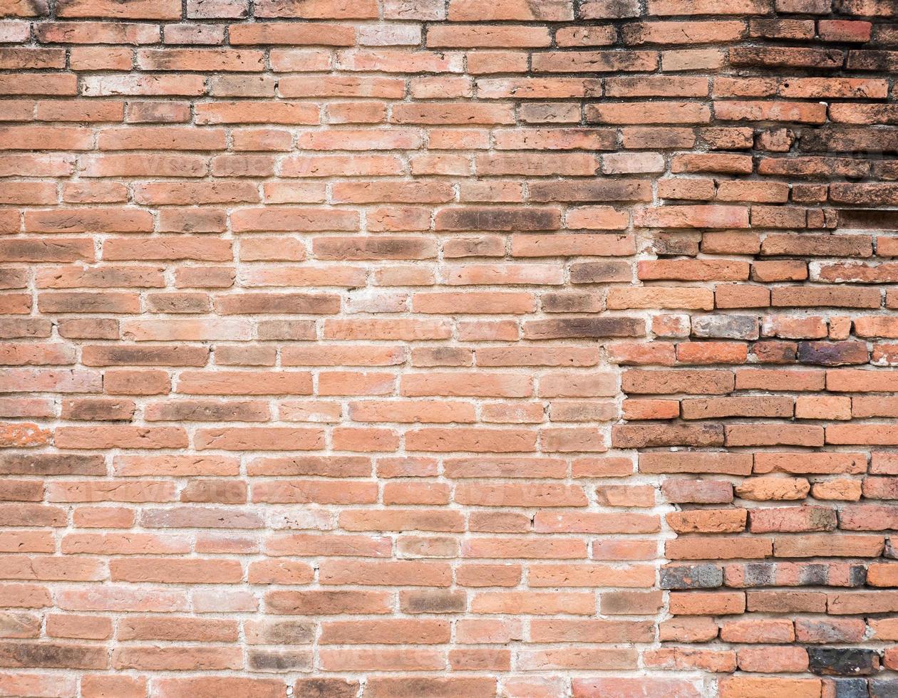 Ancient brick wall with the stain. photo