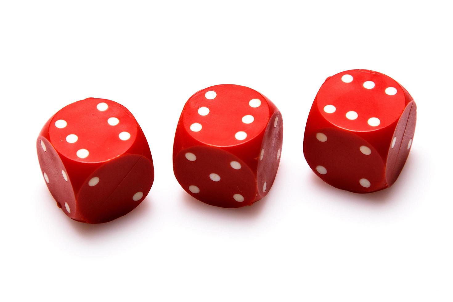 Red dices on white background photo