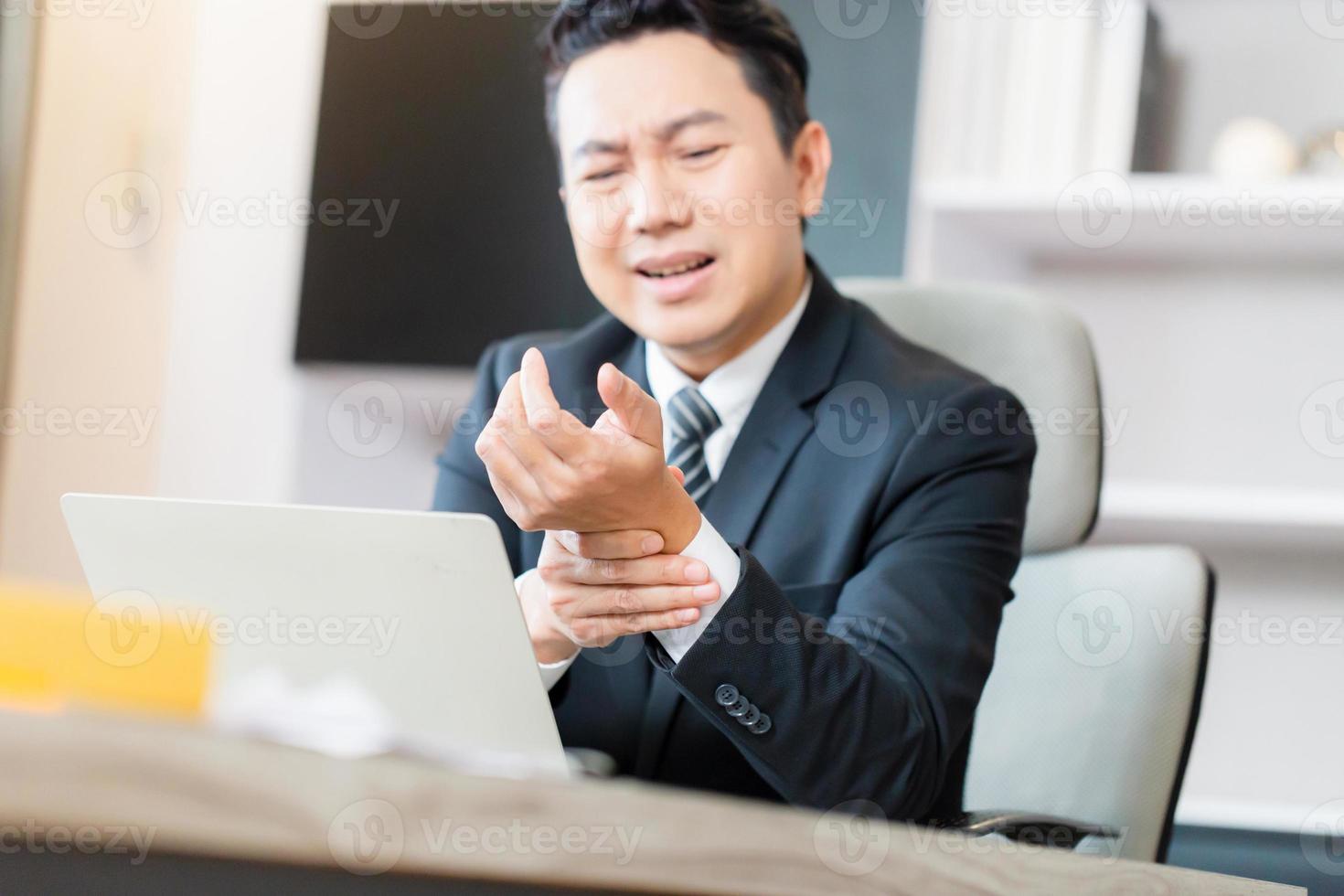 Man with hand pain, man suffering from elbow joint pain photo