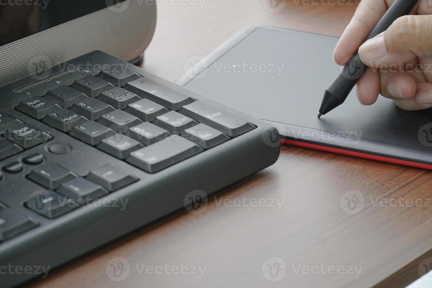 busy in creative task use digital graphic tablet and drawing photo