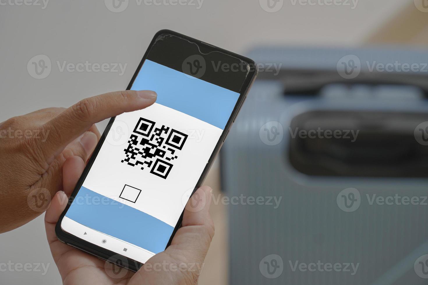 Concept of scanning a mobile QR CODE on a mobile phone. photo