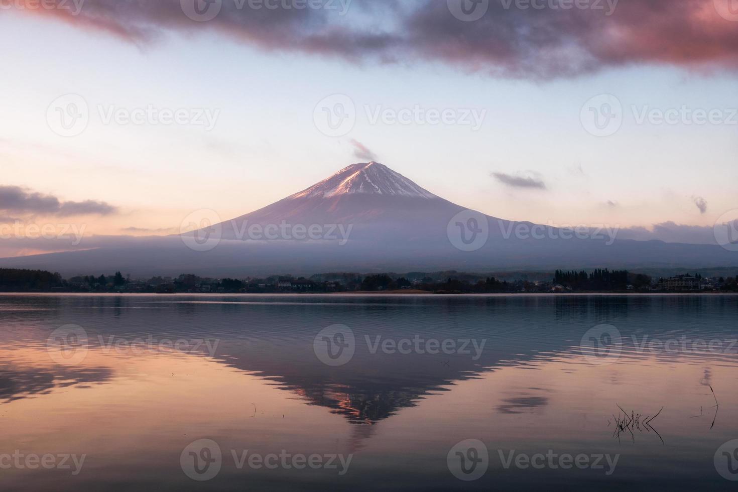 Mount volcano Fuji-san warmth reflection Kawaguchiko Lake at sunrise photo