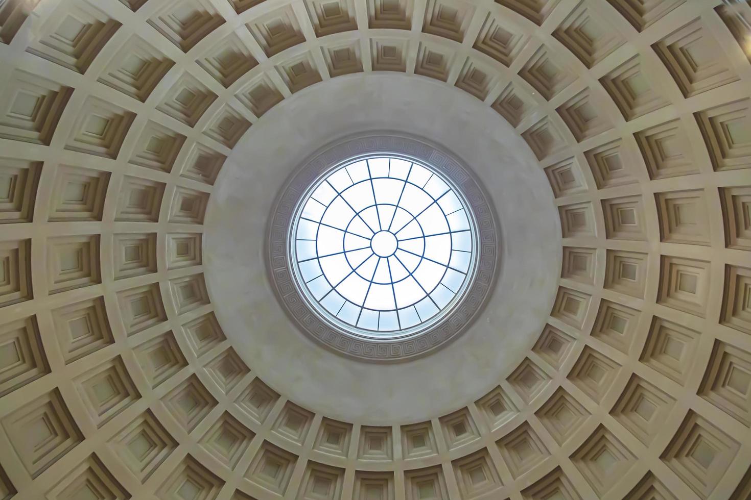 Window in a dome ceiling of a building photo