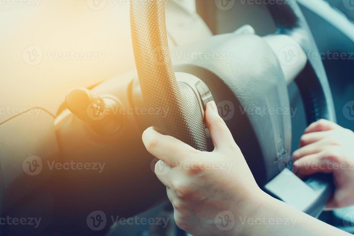 Female driving car photo