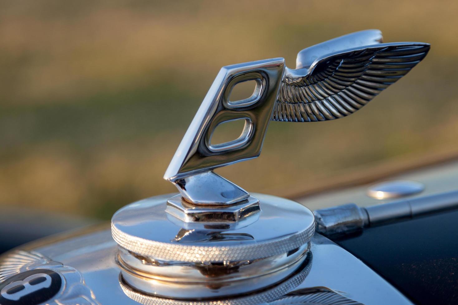 Goodwood, West Sussex, UK, 2012. Close-up modern Bentley badge photo