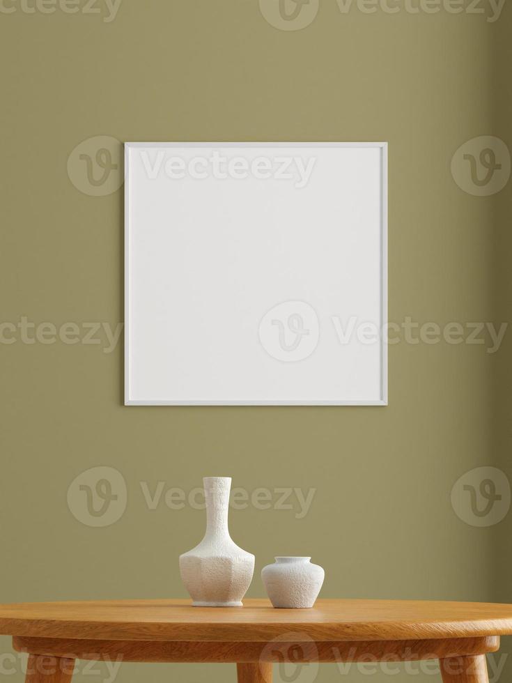 Minimalist square white poster or photo frame mockup on the wall in the living room. 3d rendering.