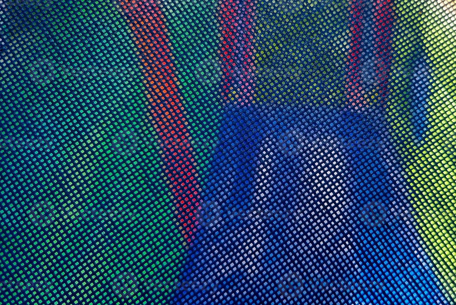 Blue plastic fine mesh close-up on the background of the playground. photo