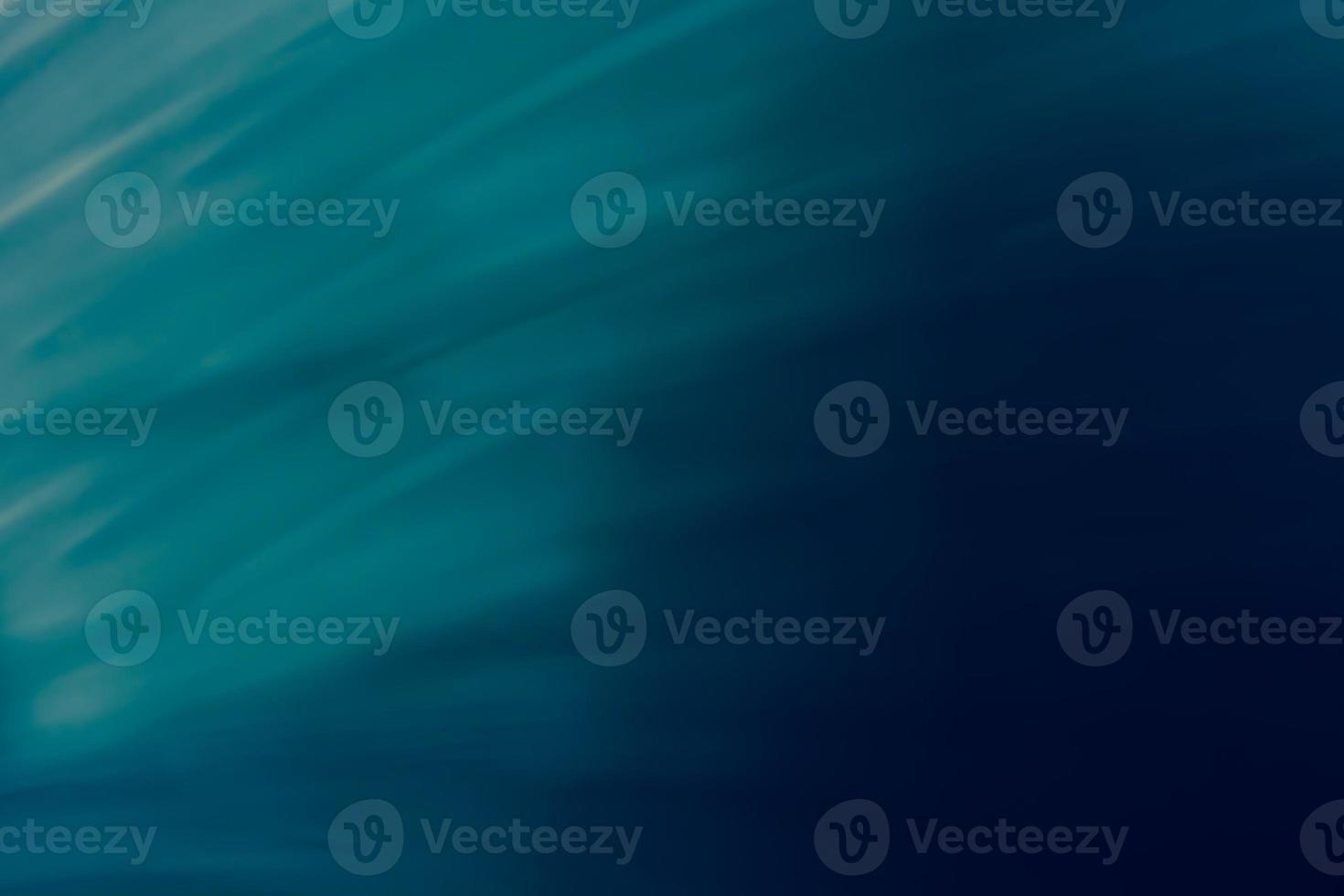 Abstract business background in blue tones with gradient and waves. photo