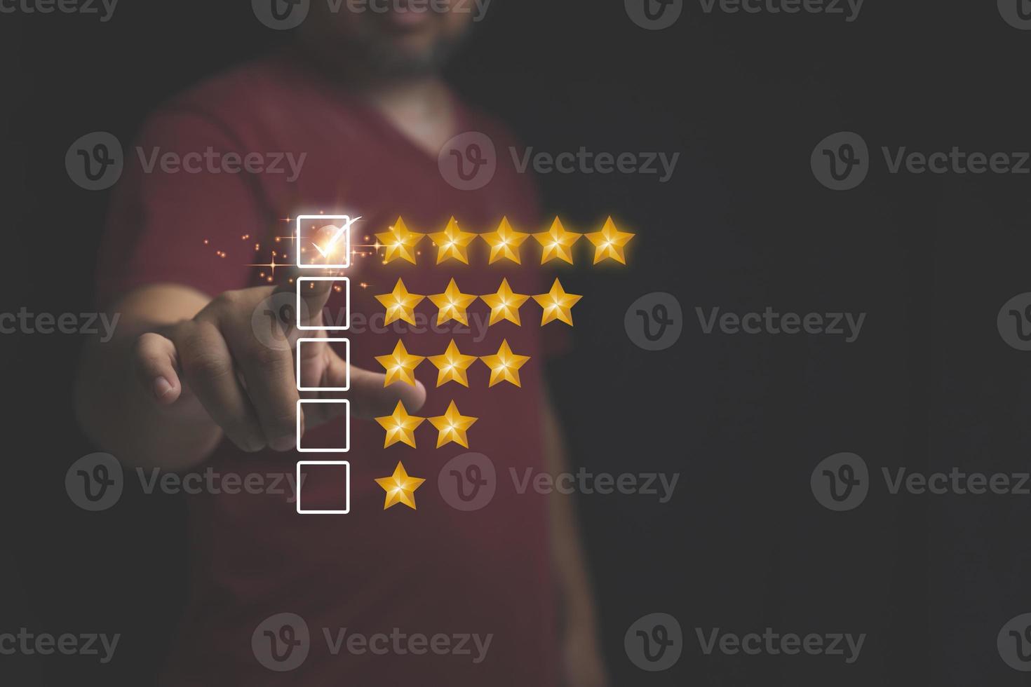 Customer review feedback survey, satisfaction ranking high. A man give rating to service experience on online application. Customer can evaluate of service leading to reputation ranking of business. photo