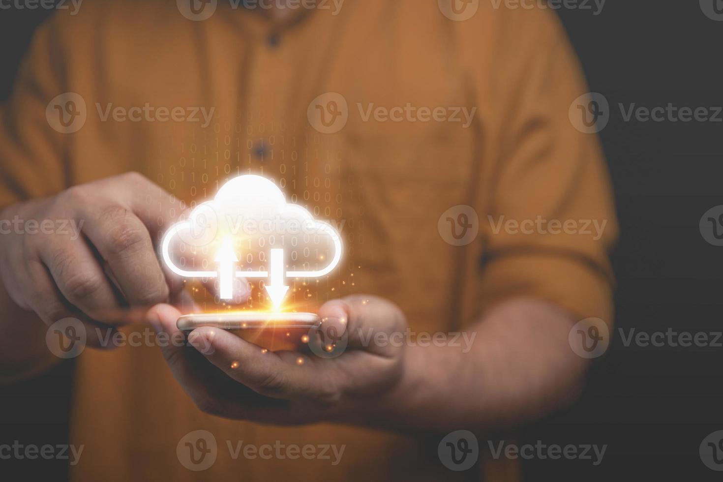 Businessman using technology smartphone with virtual cloud computing icon for information upload, download application. Technology business transformation data concept. photo