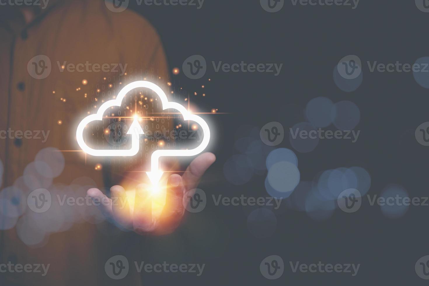 Businessman holding virtual cloud computing to transfer database. information upload, download application. Technology business transformation concept. photo
