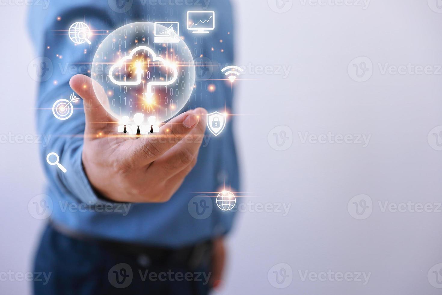 Technology business transformation concept. Businessman holding virtual cloud computing to transfer database. information upload, download application. photo
