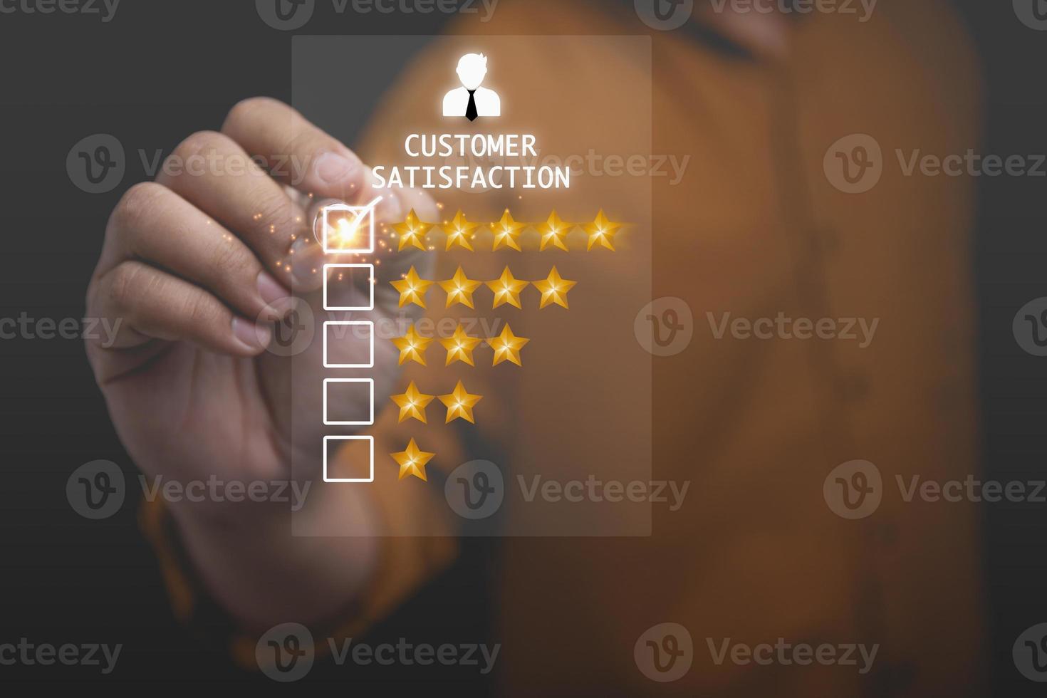 The businessman uses a pen to touch the virtual screen top 5 stars. Satisfaction to service high, Customer service, business concept, rating very impressed. photo