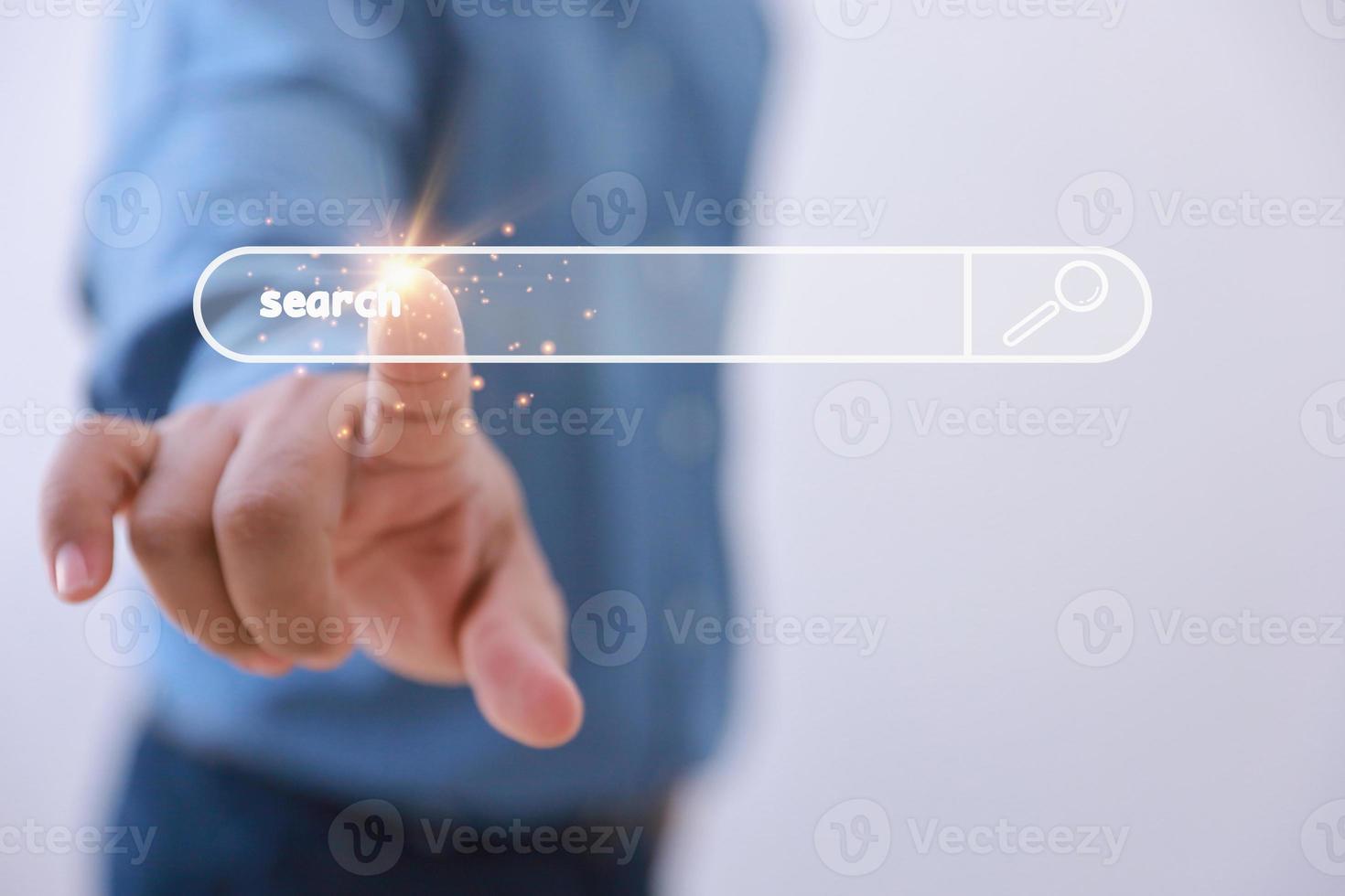 Businessman touching Bar On Virtual Screen to the searching website for information with copy space. Data Search Technology Search Engine Optimization. Use Search console with your website. photo