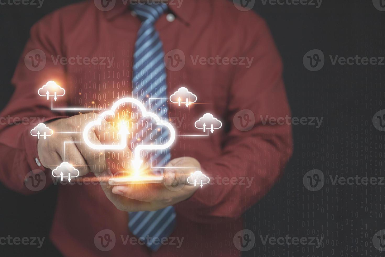 Businessman using technology smartphone with virtual cloud computing icon for information upload, download application. Technology business transformation data and connection link concept. photo