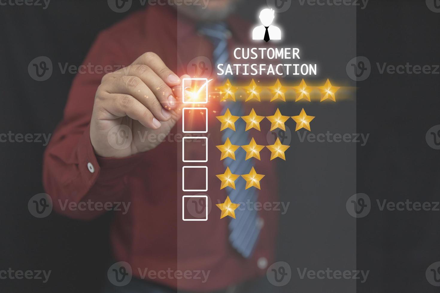 The businessman uses a pen to touch the virtual screen top 5 stars. Satisfaction to service high, Customer service, business concept, rating very impressed. photo