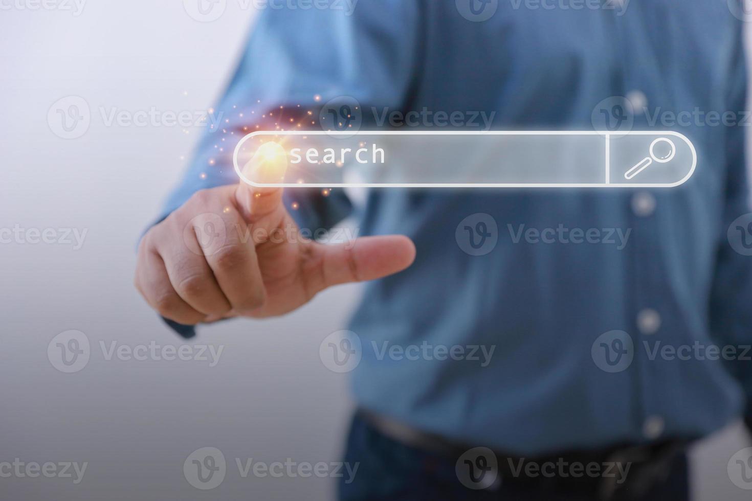 Businessman touching Bar On Virtual Screen to the searching website for information with copy space. Data Search Technology Search Engine Optimization. Use Search console with your website. photo