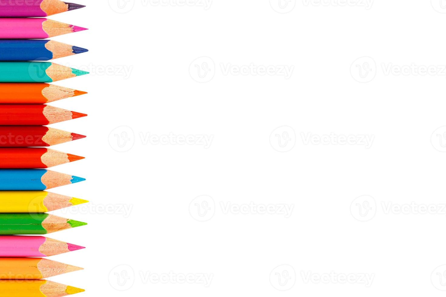 Colour pencils isolated on white background photo