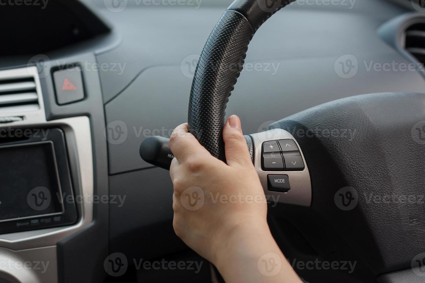 Female driving car photo