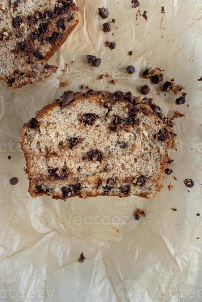 slice of chocolate chip banana bread loaf flat lay photo