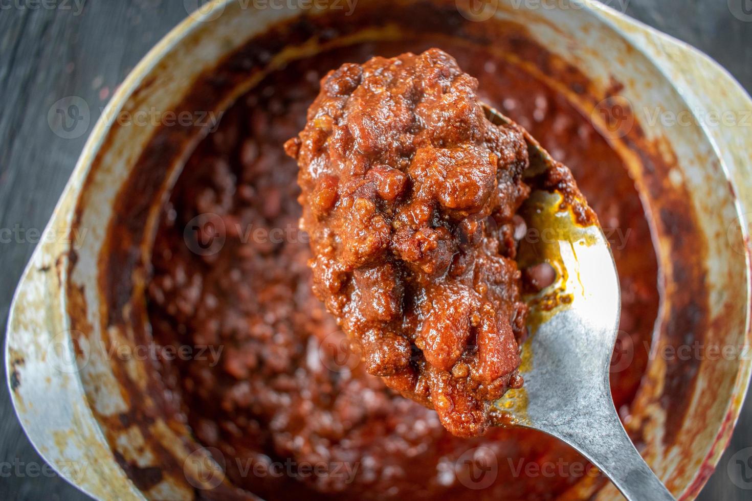 homemade pot of rustic chili with beans flat lay photo