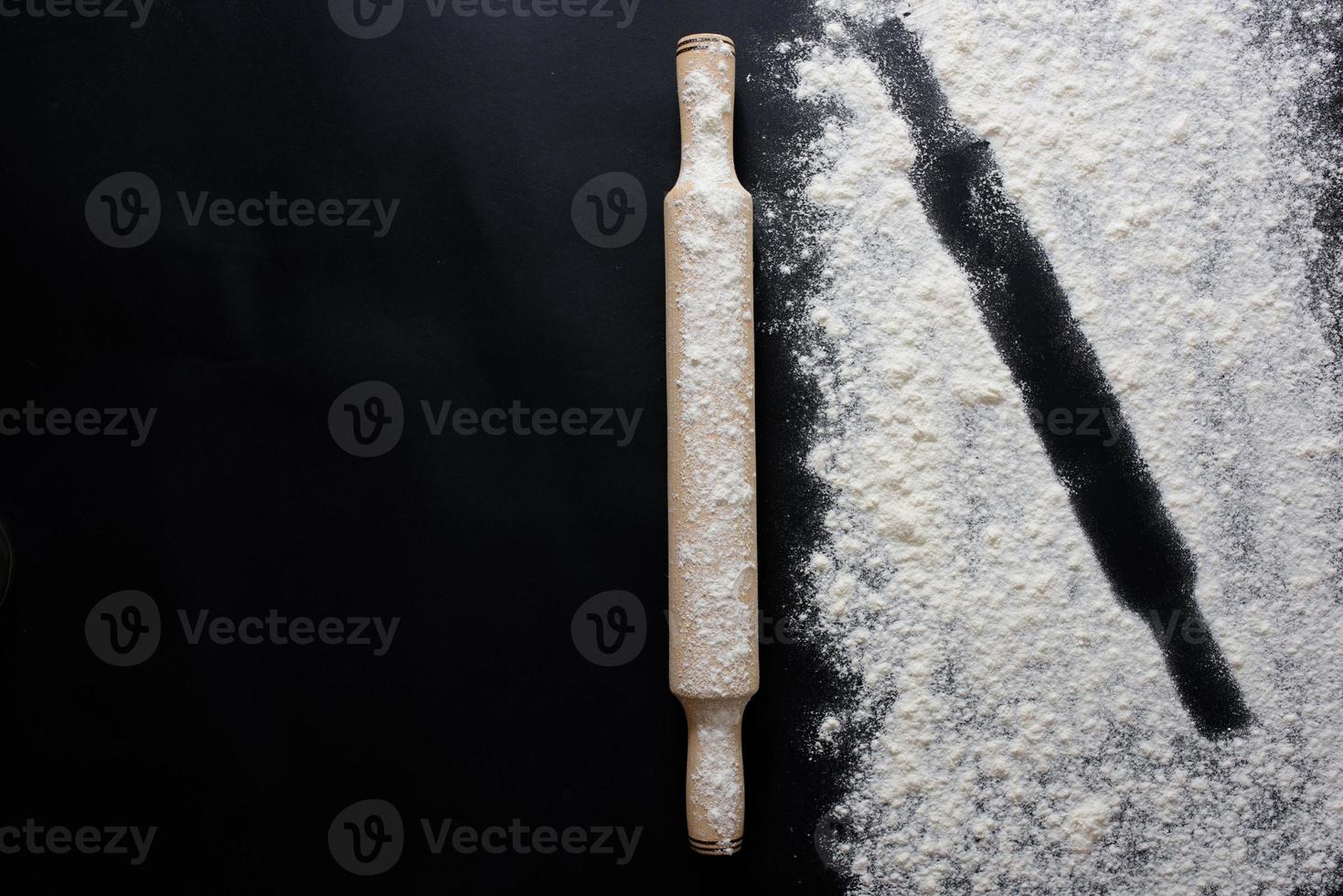 Baking background with copy space on black surface for your text. Top view. photo