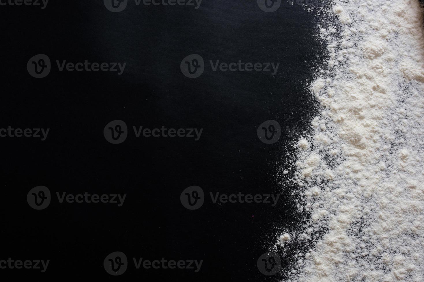 Baking background with copy space on black surface for your text. Top view. photo