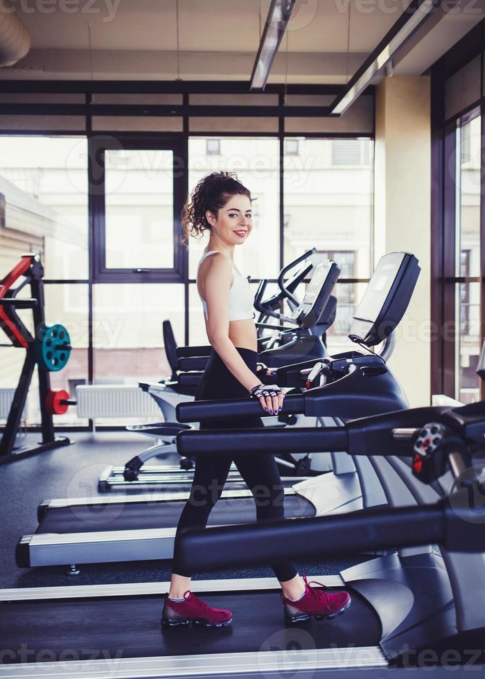 woman in sportswear workout in gym photo