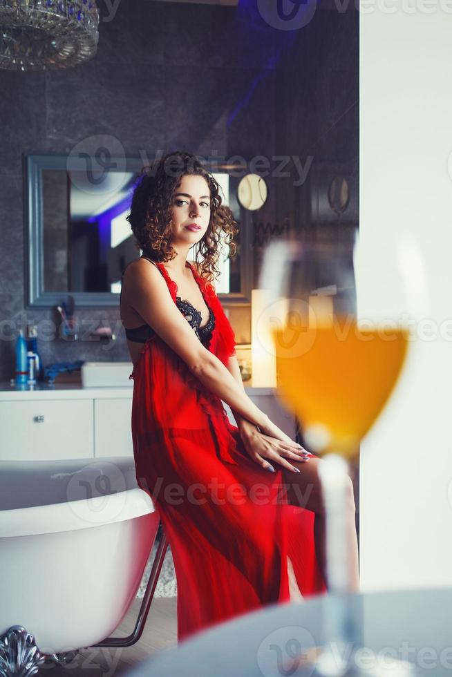 luxurious and rich lady in a red dress photo