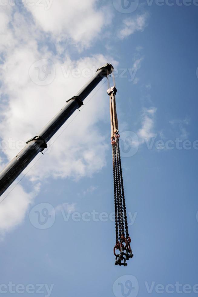 crane boom with hooks photo