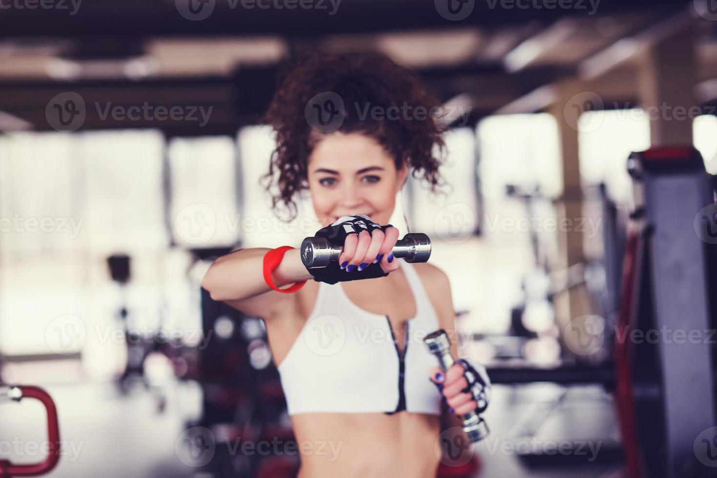 woman with dumbbells photo