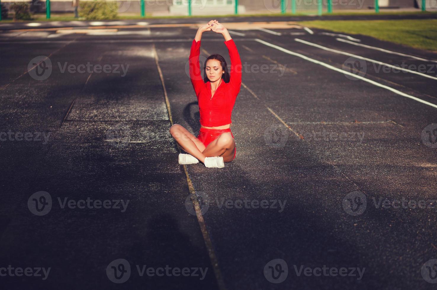 Woman Yoga warm up and relaxing photo