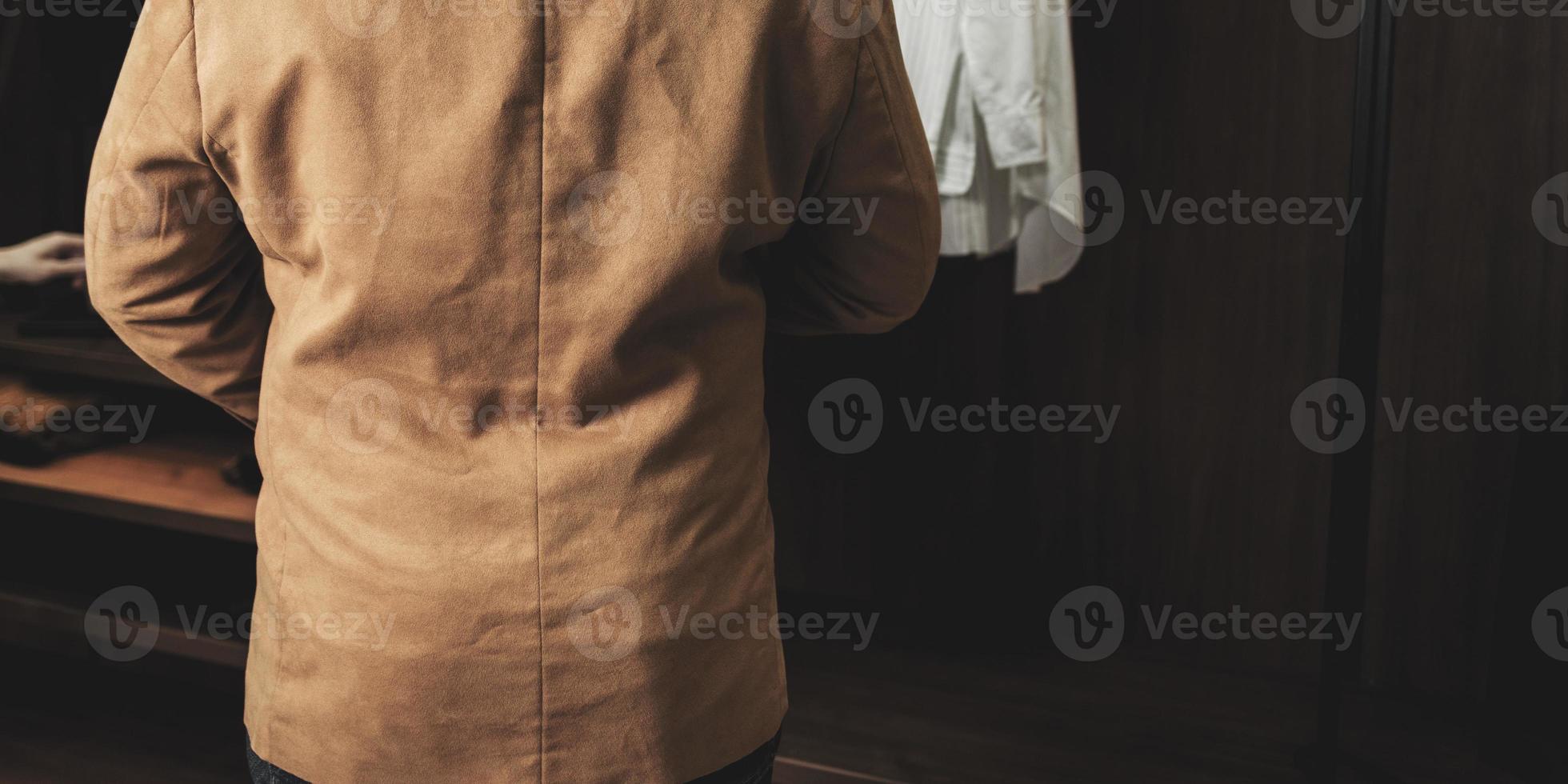 back view of a man in suit photo