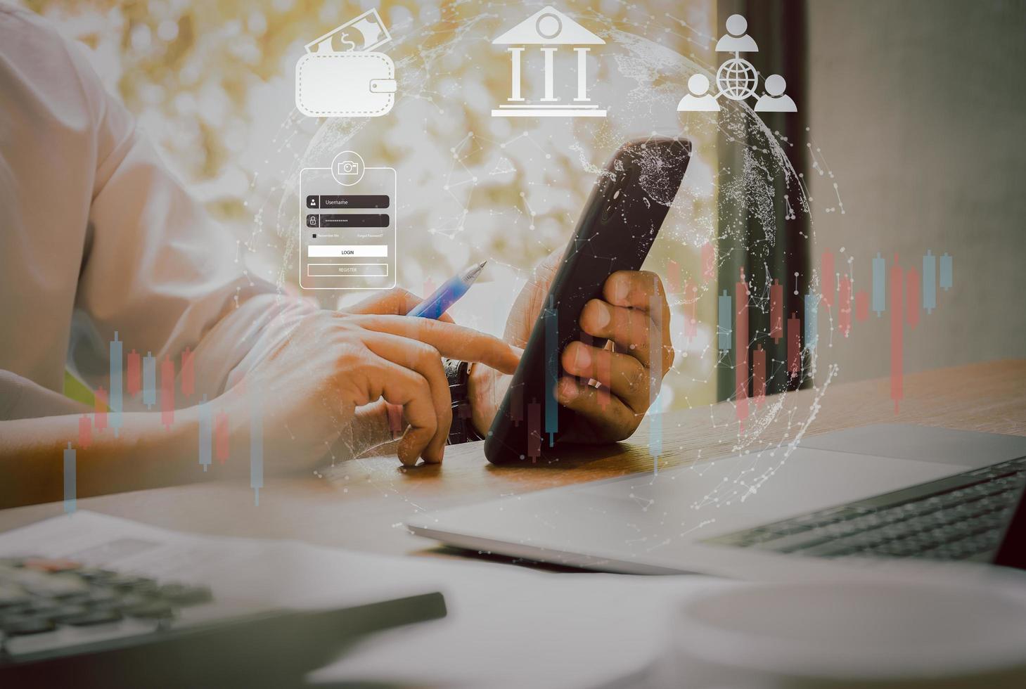 Business man working on smart phone and laptop with financial social network diagram. photo
