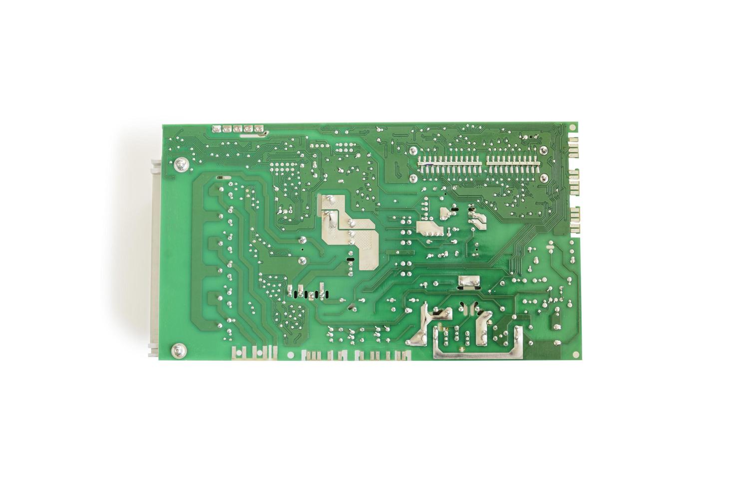 Back side of main Electronic circuit green board isolated in clipping path. photo