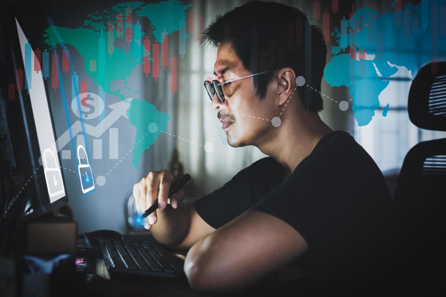 Business financial man working on computer with financial data with digital diagram. photo