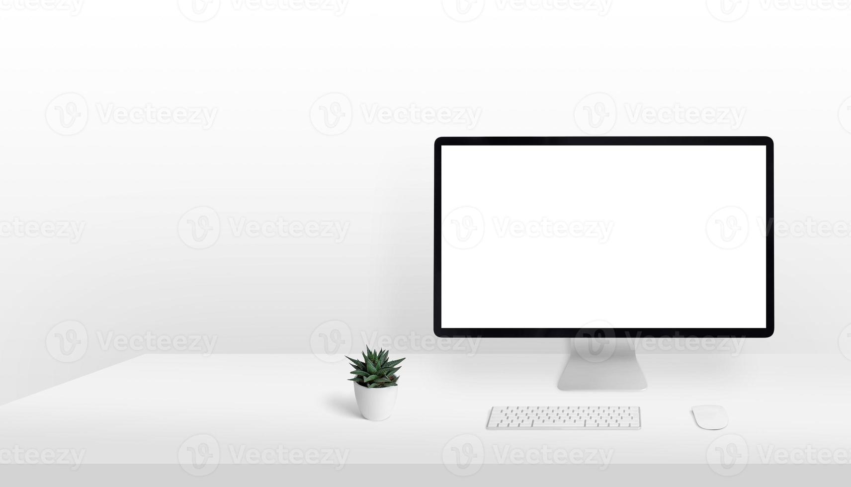 Computer display mockup on work desk with copy space beside. Clean, light composition. Isolated screen for page presentation photo