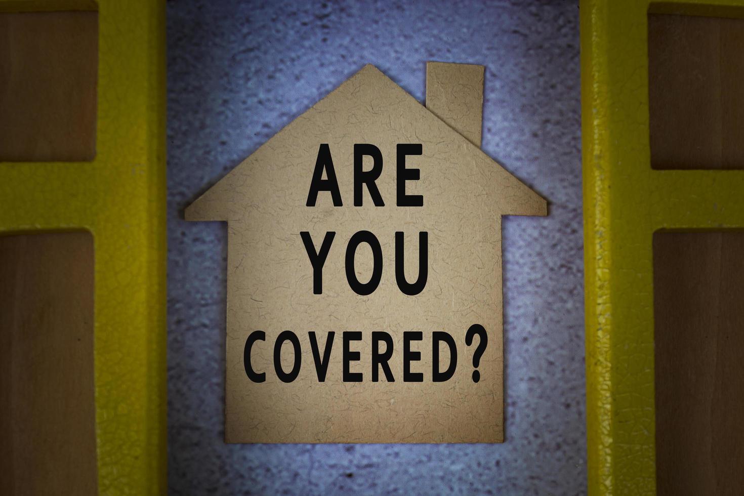 Are you covered text on house paper model with window frame background photo