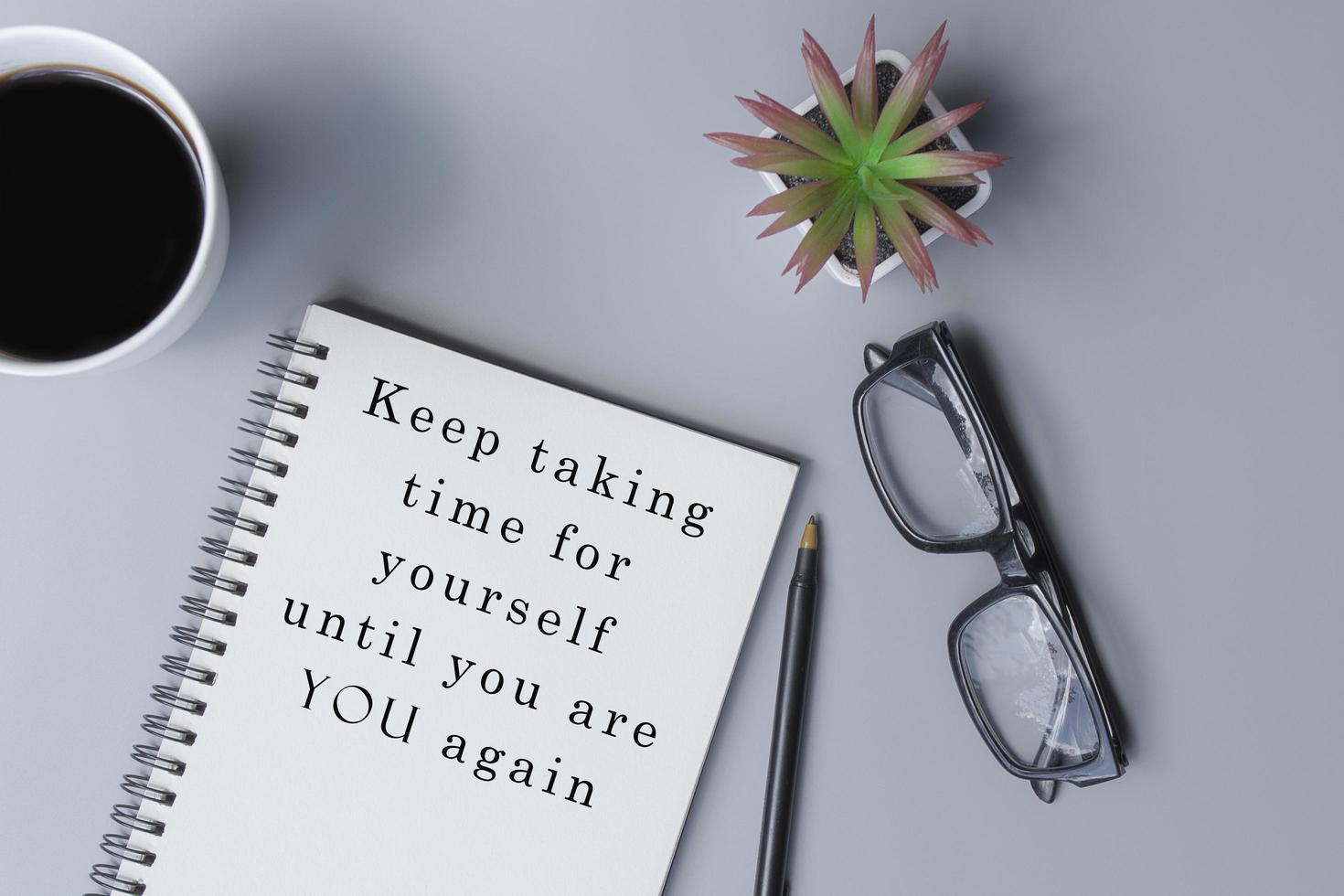 Motivational and inspirational quote on notepad photo