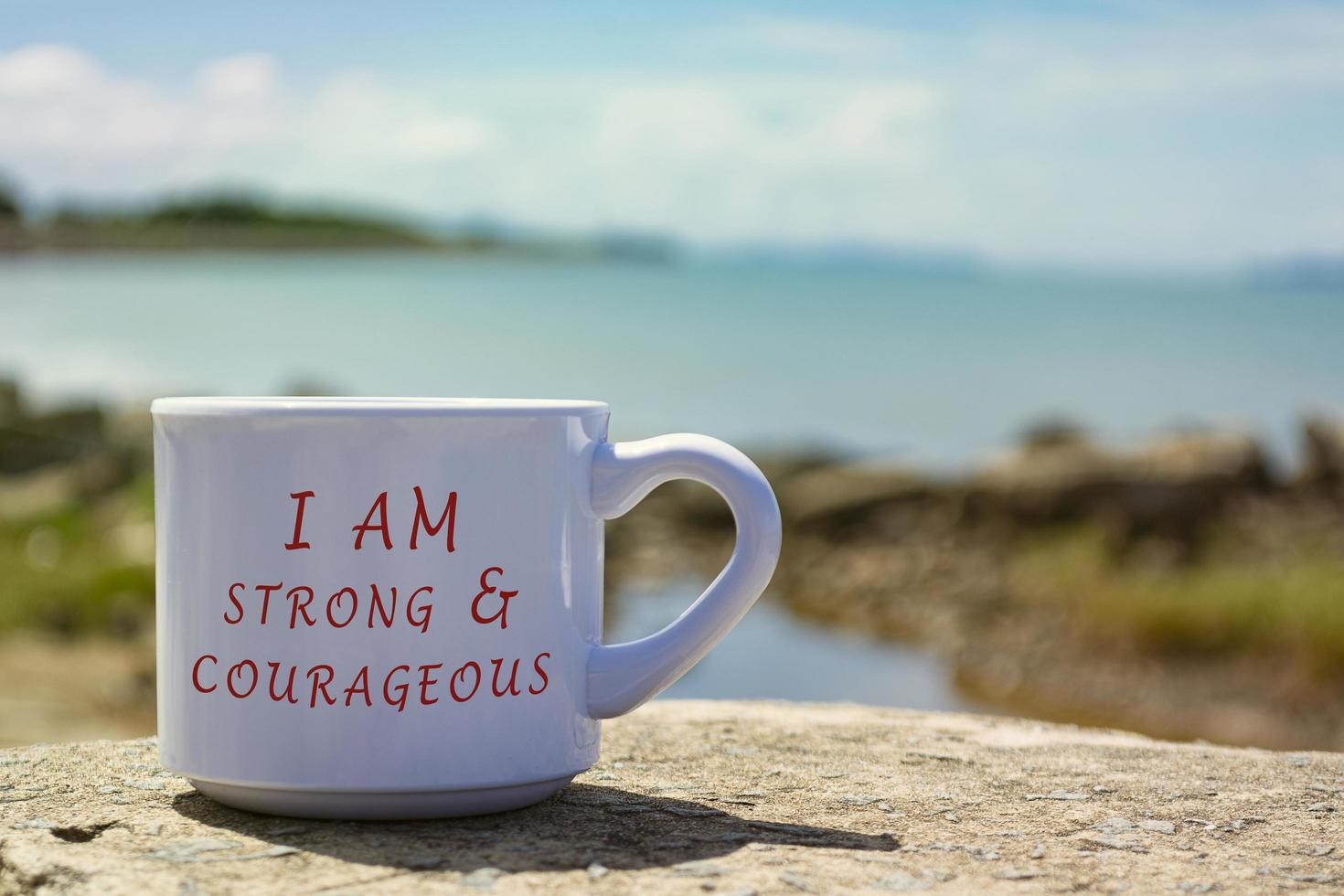 Motivational and Inspirational quote on a white coffee cup photo